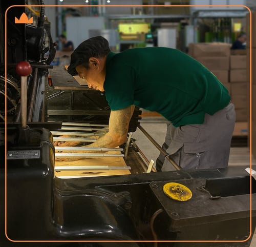 Dutch Leaf Cone employee working in a factory on a cone machine