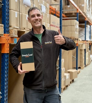 A Dutch Leaf Cone employer holding the box of the cones